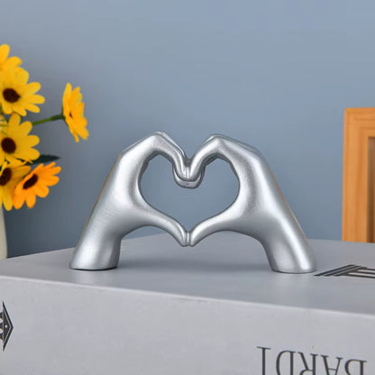 Exquisite Gold Heart Hand Statue - Elegant Love Gesture Sculpture for Your Living Space
